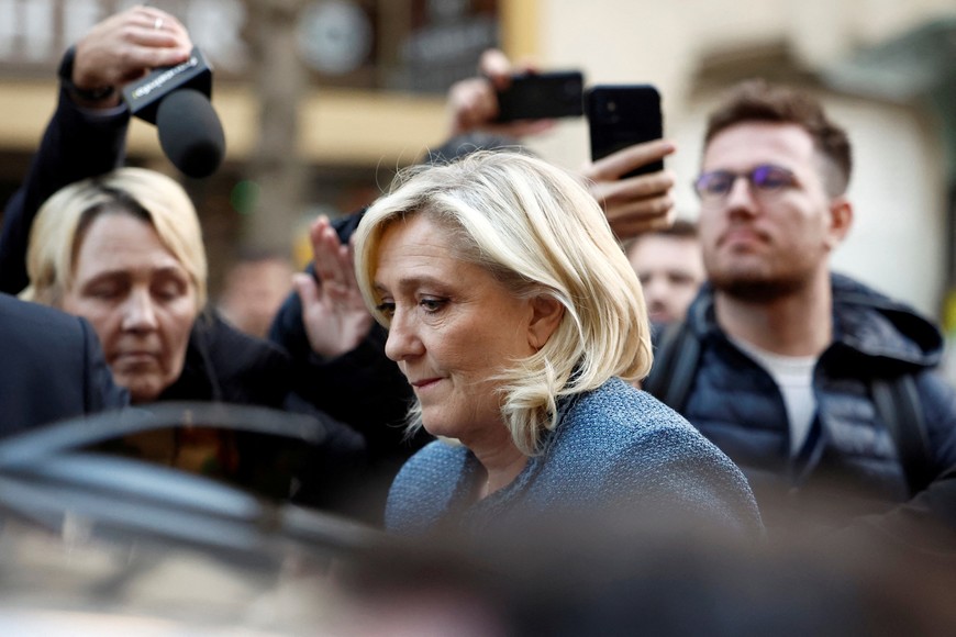French far-right leader Marine Le Pen, member of parliament from the Rassemblement National (National Rally - RN) party, leaves the party's headquarters on the day of the verdict of the trial of her alongside 24 other defendants (party officials and employees, former lawmakers and parliamentary assistants) and the RN party itself, over accusations of misappropriation of European Union funds, in Paris, France, March 31, 2025. REUTERS/Abdul Saboor?