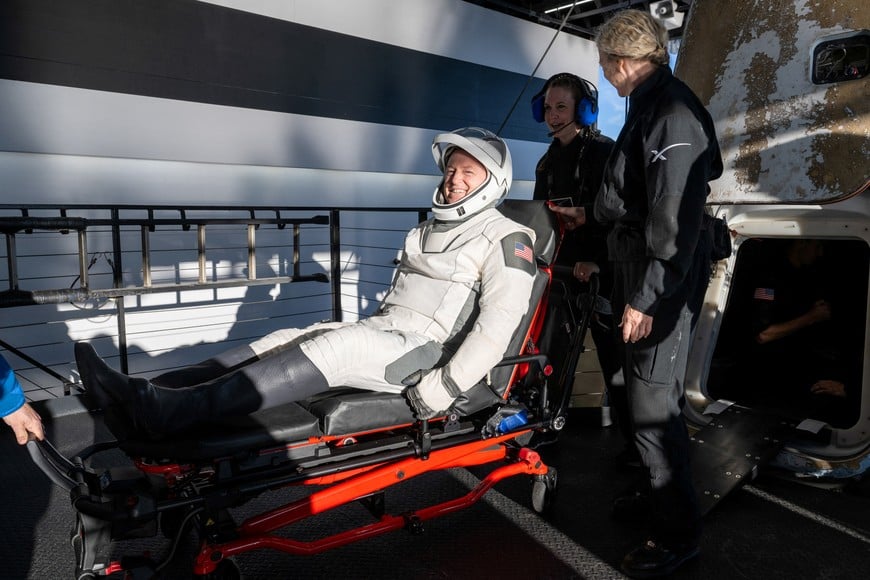 NASA astronaut Butch Wilmore is helped out of a SpaceX Dragon spacecraft onboard the SpaceX recovery ship MEGAN after he, NASA astronauts Nick Hague, Suni Williams, and Roscosmos cosmonaut Aleksandr Gorbunov landed in the water off the coast of Tallahassee, Florida, Tuesday, March 18, 2025. NASA/Keegan Barber/ Handout via REUTERS