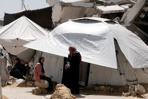 El lugar funcionaba como centro de refugiados. Fotos: Reuters