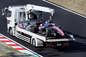 Formula One F1 - Japanese Grand Prix - Suzuka Circuit, Suzuka, Japan - April 4, 2025
The car of Alpine's Jack Doohan is towed away by marshals after his crash during practice REUTERS/Issei Kato