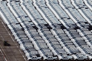 Automobiles unloaded from a cargo ship are parked at Tanjong Pagar container terminal in Singapore April 3, 2025. Image taken through glass window. REUTERS/Edgar Su     TPX IMAGES OF THE DAY