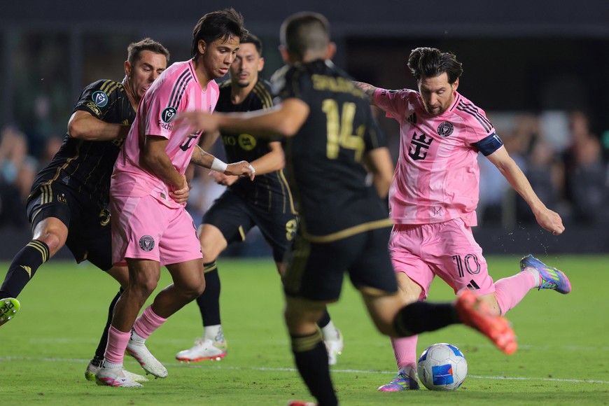 Apr 9, 2025; Ft. Lauderdale, Florida, USA; Inter Miami CF forward Lionel Messi (10) scores against the Los Angeles FC during the first half at Chase Stadium. Mandatory Credit: Sam Navarro-Imagn Images