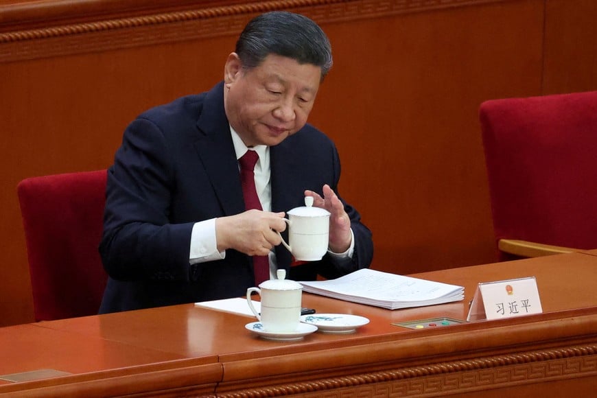 Chinese President Xi Jinping attends the opening session of the National People's Congress (NPC) at the Great Hall of the People in Beijing, China, March 5, 2025.REUTERS/Florence Lo TPX IMAGES OF THE DAY