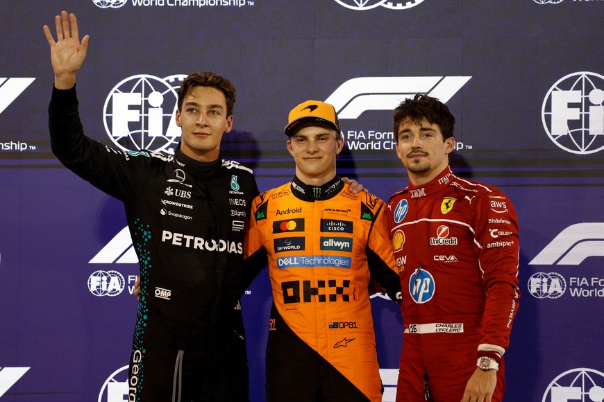 Formula One F1 - Bahrain Grand Prix - Bahrain International Circuit, Sakhir, Bahrain - April 12, 2025
McLaren's Oscar Piastri pose after qualifying in pole position with second placed McLaren's Oscar Piastri and third placed Ferrari's Charles Leclerc REUTERS/Hamad I Mohammed