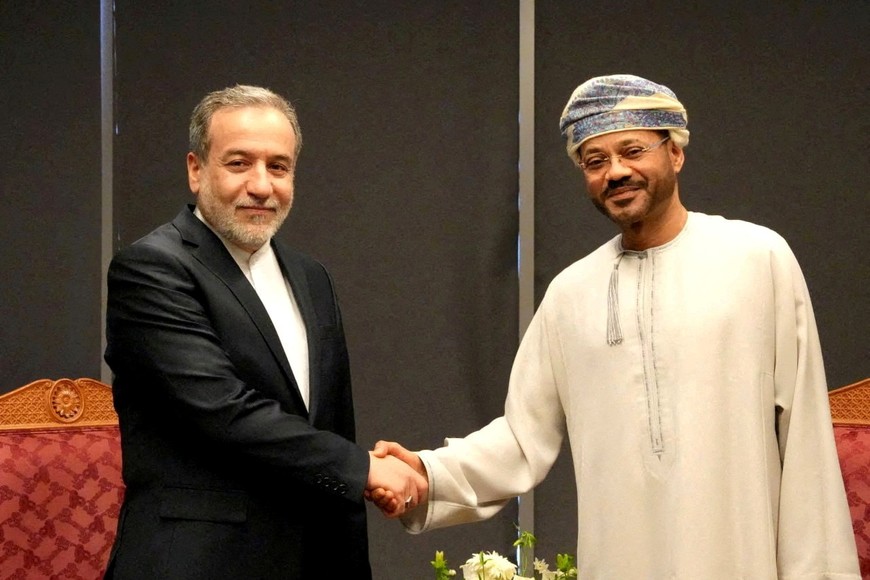 Iranian Foreign Minister Abbas Araghchi meets with Omani Foreign Minister Sayyid Badr Albusaidi in Muscat, Oman, April 12, 2025. Iranian Ministry of Foreign Affairs/WANA (West Asia News Agency)/ Handout via REUTERS ATTENTION EDITORS - THIS PICTURE WAS PROVIDED BY A THIRD PARTY.     TPX IMAGES OF THE DAY