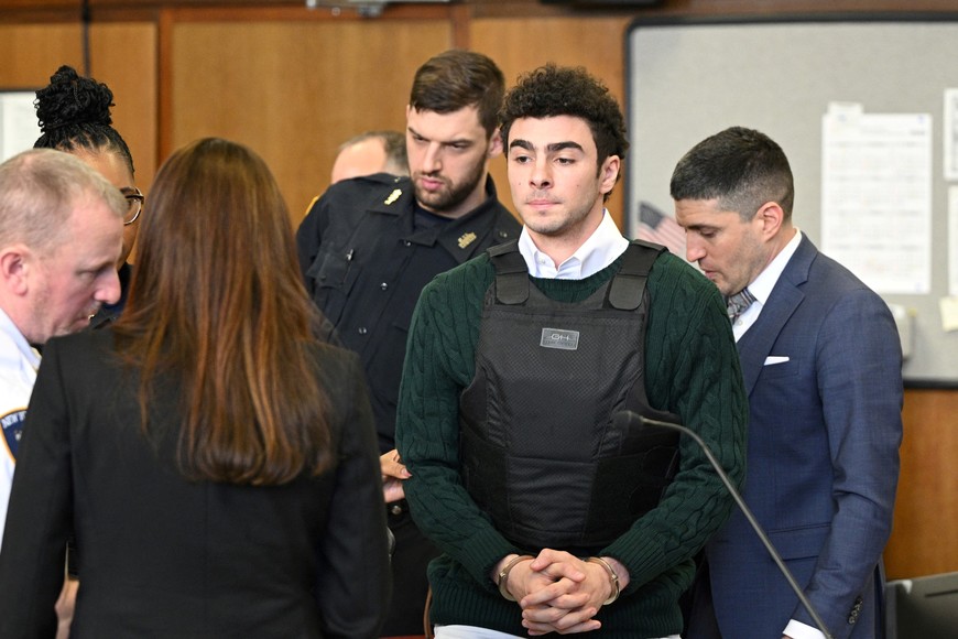 Luigi Mangione, the suspect in the killing of UnitedHealth Group chief executive Brian Thompson, appears in Manhattan Supreme Court on New York state murder and terrorism charges in New York City, U.S., February 21, 2025. Curtis Means/Pool via REUTERS