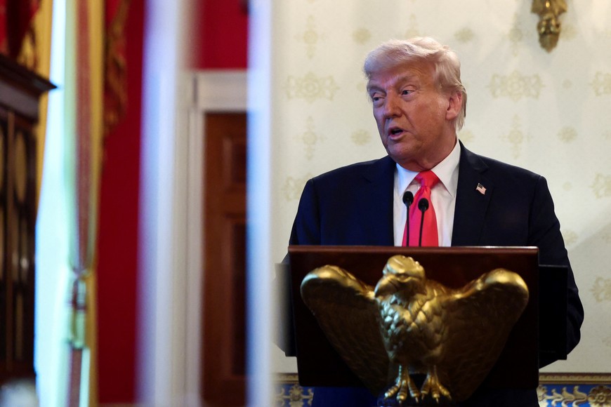 U.S. President Donald Trump speaks during a prayer service and dinner ahead of Easter Sunday, at the White House in Washington, D.C., U.S., April 16, 2025. REUTERS/Evelyn Hockstein