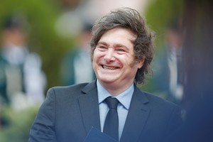 Argentina's President Javier Milei reacts on the day of a meeting his Paraguayan counterpart Santiago Pena (not pictured), in Asuncion, Paraguay April 9, 2025. REUTERS/Cesar Olmedo