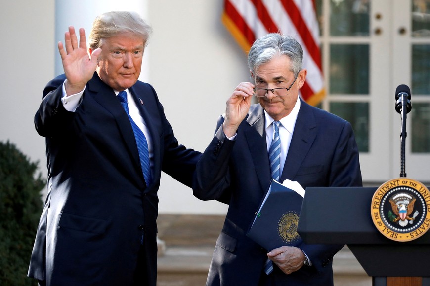 FILE PHOTO: U.S. President Donald Trump gestures with Jerome Powell, his nominee to become chairman of the U.S. Federal Reserve at the White House in Washington, U.S., November 2, 2017. REUTERS/Carlos Barria/File Photo