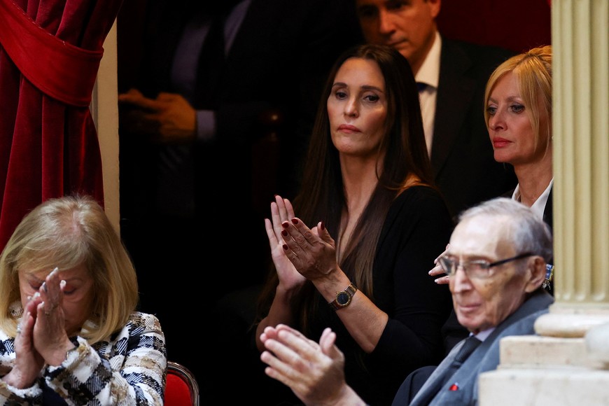 Norberto Milei and Alicia Lucich, the parents of Argentina's President Javier Milei, watch with Amalia "Yuyito" Gonzalez (top R) as he presents the fiscal year 2025 budget, at the National Congress in Buenos Aires, Argentina, September 15, 2024. REUTERS/Agustin Marcarian