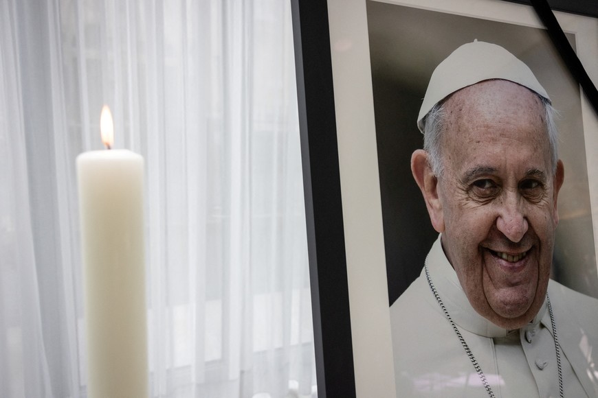 A photograph of Pope Francis is seen at the Apostolic Nunciature, on the day that German president Steinmeier signs a book of condolences for Pope Francis in Berlin, Germany, April 25, 2025. REUTERS/ Nadja Wohlleben NO RESALES. NO ARCHIVES