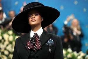 Rihanna poses during the Met Gala, an annual fundraising gala held for the benefit of the Metropolitan Museum of Art's Costume Institute with this year's theme 'Superfine: Tailoring Black Style,' in New York City, New York, U.S., May 5, 2025. REUTERS/Mario Anzuoni