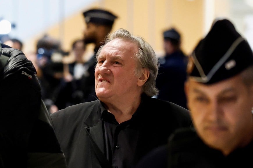 French actor Gerard Depardieu appears on the day of his trial for two sexual assaults allegedly committed on the set of the film "Les Volets Verts", at the courthouse in Paris, France, March 24, 2025. REUTERS/Benoit Tessier