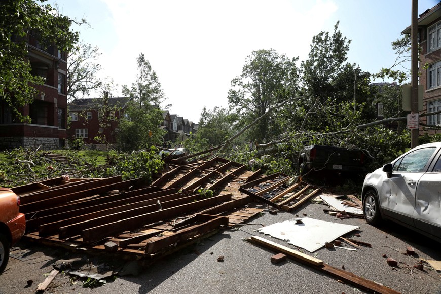A roof from a home blocks a residential street after a powerful tornado ripped through the city, in St. Louis, Missouri, U.S., May 16, 2025. REUTERS/Lawrence Bryant