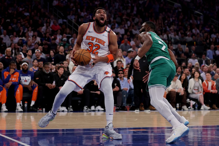 May 16, 2025; New York, New York, USA; New York Knicks center Karl-Anthony Towns (32) drives to the basket against Boston Celtics guard Jaylen Brown (7) during the first quarter of game six in the second round of the 2025 NBA Playoffs at Madison Square Garden. Mandatory Credit: Brad Penner-Imagn Images