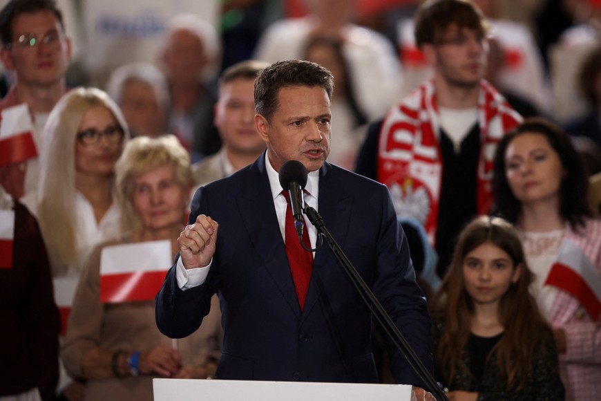 Warsaw Mayor Rafal Trzaskowski, the presidential candidate of the Civic Coalition reacts to exit polls for the first round of Poland's presidential election, in Sandomierz, Poland, May 18, 2025. REUTERS/Kacper Pempel
