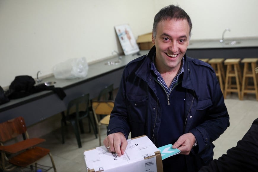 Presidential spokesman and legislative candidate in the city of Buenos Aires, Manuel Adorni votes during the legislative elections of the city of Buenos Aires, Argentina, May 18, 2025. REUTERS/Tomas Cuesta