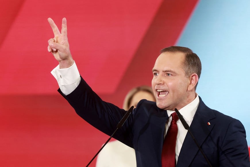 Karol Nawrocki, a Polish presidential candidate supported by the main opposition party Law and Justice (PiS), reacts to the exit polls for the first round of Poland's presidential election, in Gdansk, Poland, May 18, 2025. REUTERS/Lukasz Glowala