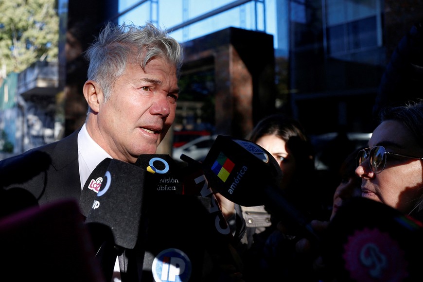 Fernando Burlando, lawyer for Dalma and Gianinna Maradona, daughters of soccer legend Diego Maradona, talks to the press as he arrives at the San Isidro court ahead of the trial for the death of Diego Maradona, in San Isidro, on the outskirts of Buenos Aires, Argentina May 13, 2025. REUTERS/Francisco Loureiro