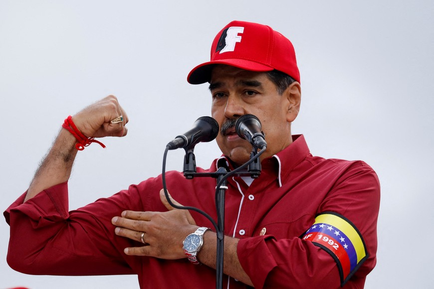 Venezuela's President Nicolas Maduro gestures during a rally to mark the anniversary of late Venezuelan President Hugo Chavez's initial coup attempt in 1992, in Caracas, Venezuela February 4, 2025. REUTERS/Leonardo Fernandez Viloria     TPX IMAGES OF THE DAY