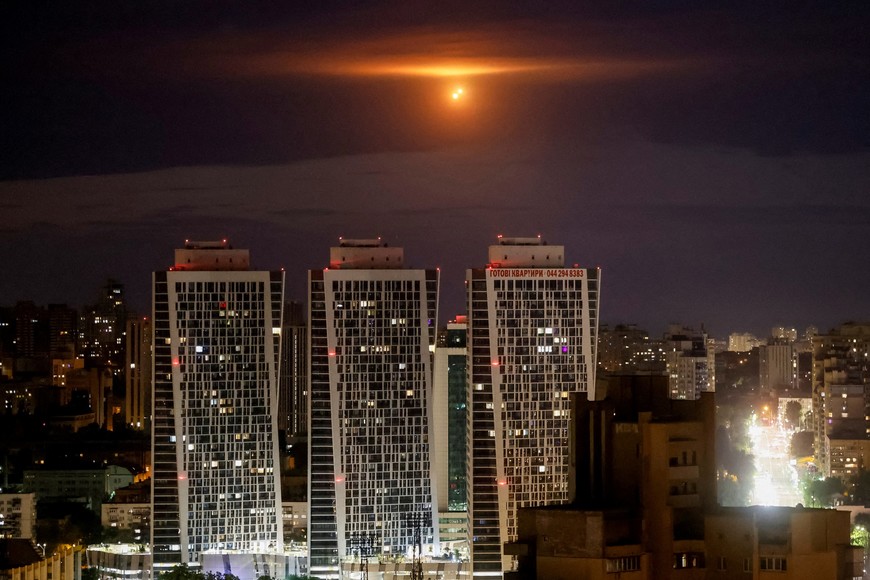 An explosion of a drone is seen in the sky over the city during a Russian drone strike, amid Russia's attack on Ukraine, in Kyiv, Ukraine May 23, 2025. REUTERS/Gleb Garanich