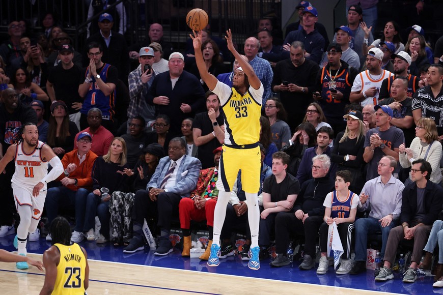 May 23, 2025; New York, New York, USA; Indiana Pacers center Myles Turner (33) shoots against New York Knicks guard Jalen Brunson (11) in the fourth quarter during game two of the eastern conference finals for the 2025 NBA Playoffs at Madison Square Garden. Mandatory Credit: Wendell Cruz-Imagn Images