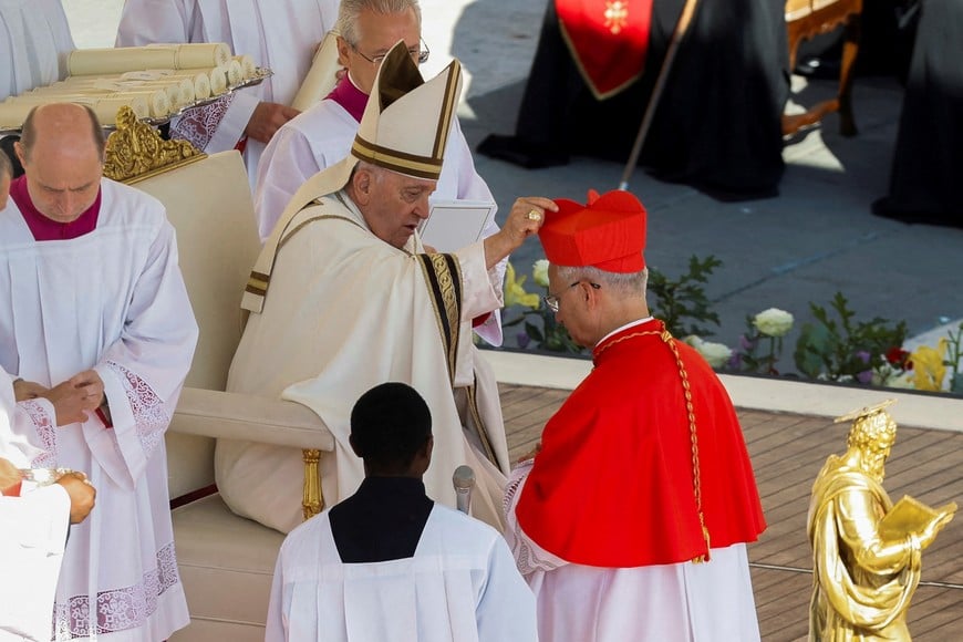 Pope Francis blesses Cardinal Robert Prevost during a consistory ceremony to elevate Roman Catholic prelates to the rank of cardinal, in Saint Peter's square at the Vatican, September 30, 2023. REUTERS/Remo Casilli