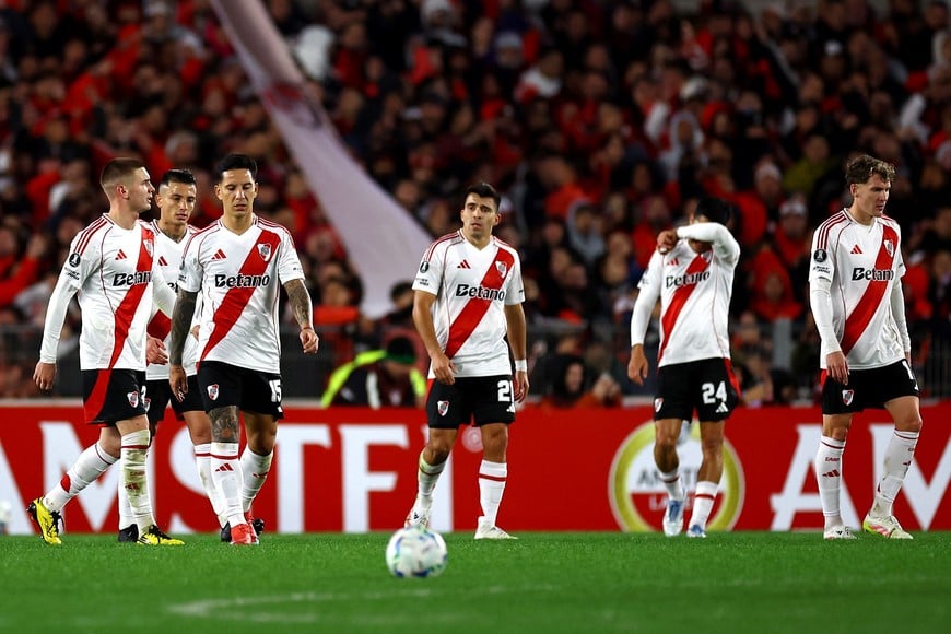 Soccer Football - Copa Libertadores - Group Stage - River Plate v Universitario - Estadio Mas Monumental, Buenos Aires, Argentina - May 27, 2025
River Plate's Marcos Acuna, Enzo Perez, Franco Mastantuono and Sebastian Driussi look dejected after Universitario's first goal scored by Jairo Concha REUTERS/Agustin Marcarian