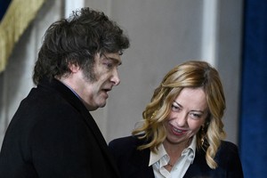 (L-R) Argetina's President Javier Milei and Prime Minister of Italy Giorgia Meloni arrive for the inauguration ceremony before Donald Trump is sworn in as the 47th US President in the US Capitol Rotunda in Washington, DC, on January 20, 2025.     SAUL LOEB/Pool via REUTERS