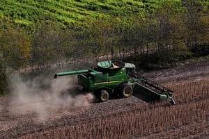 A drone view shows a harvester working in a soybean plantation in San Andres de Giles, on the outskirts of Buenos Aires, Argentina, May 12, 2025. REUTERS/Martin Cossarini