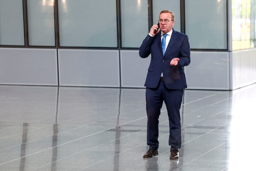 German Defence Minister Boris Pistorius uses his phone after a family photo on the day of a meeting of NATO Defence Ministers at the Alliance headquarters in Brussels, Belgium June 5, 2025. REUTERS/Yves Herman