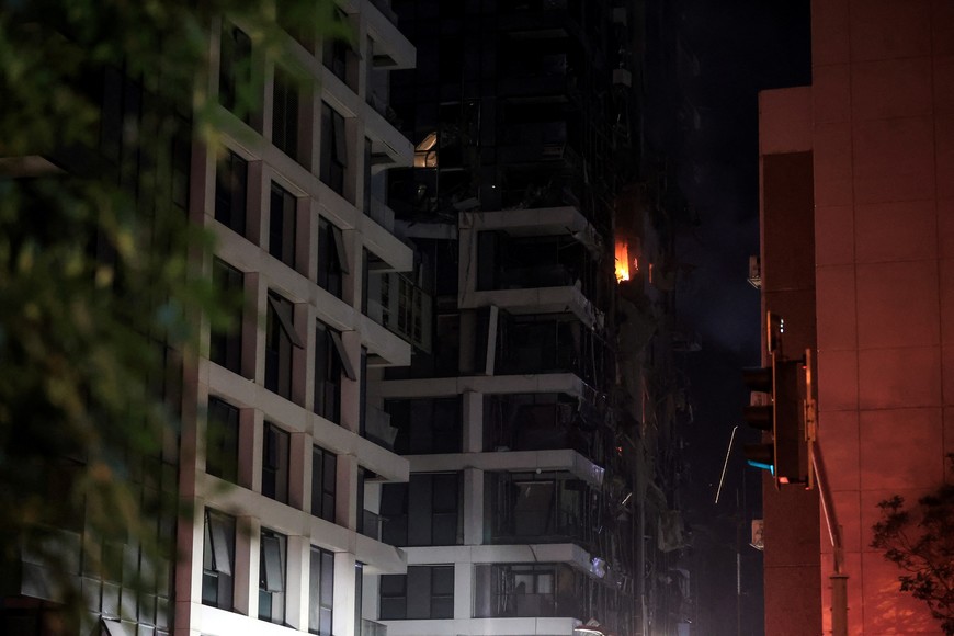 Fire burns in a building at an impact site following a missile attack from Iran on Israel, at Tel Aviv, Israel,   June 13, 2025 REUTERS/Itai Ron  

ISRAEL OUT. NO COMMERCIAL OR EDITORIAL SALES IN ISRAEL