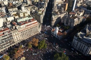 Supporters of Argentina's former President Cristina Fernandez de Kirchner gather in Plaza de Mayo square, after an Argentine judge approved her request to serve out her six-year prison sentence for corruption at home, in Buenos Aires, Argentina, June 18, 2025. REUTERS/Martin Cossarini