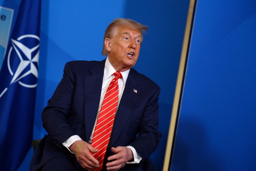 U.S. President Donald Trump speaks, as he meets with NATO Secretary General Mark Rutte (not pictured) at the NATO summit in The Hague, Netherlands June 25, 2025. REUTERS/Piroschka Van De Wouw/Pool