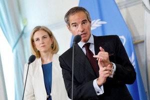IAEA Director General Rafael Grossi speaks during a doorstep with Austrian Foreign Minister Beate Meinl-Reisinger, Austrian Chancellor Christian Stocker (not pictured) and Austrian Vice Chancellor Andreas Babler (not pictured) at the Austrian Chancellery, in Vienna, Austria, June 25, 2025. REUTERS/Lisa Leutner