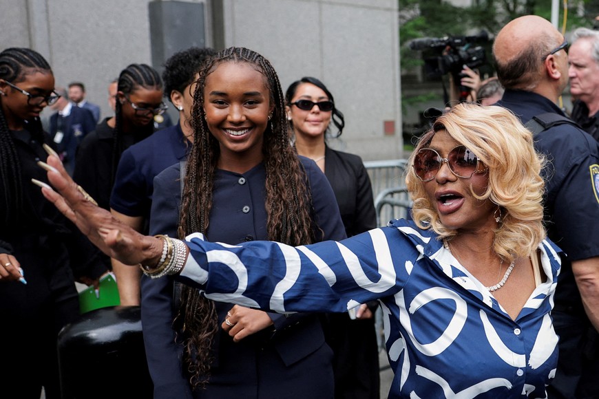Janice Combs and Chance Combs walk outside the U.S. federal court, after the jury reached verdicts in the Sean "Diddy" Combs sex trafficking and racketeering conspiracy trial, in Manhattan, New York City, U.S., July 2, 2025. REUTERS/Jeenah Moon     TPX IMAGES OF THE DAY