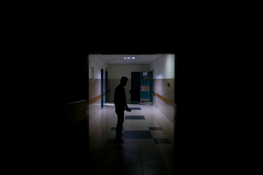 A Palestinian stands at Nasser Hospital, which Gaza's health ministry says is at risk of shutting down due to the Israeli blockade of fuel, as the ongoing shortage has already forced the facility to reduce its capacity, in Khan Younis in the southern Gaza Strip July 9, 2025. REUTERS/Hatem Khaled