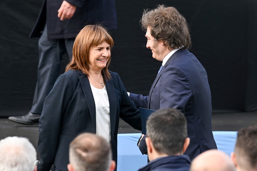 Argentina's President Javier Milei and Security Minister Patricia Bullrich attend a press conference at the Federal Police Mounted Division, in Buenos Aires, Argentina, June 17, 2025. REUTERS/Martin Cossarini