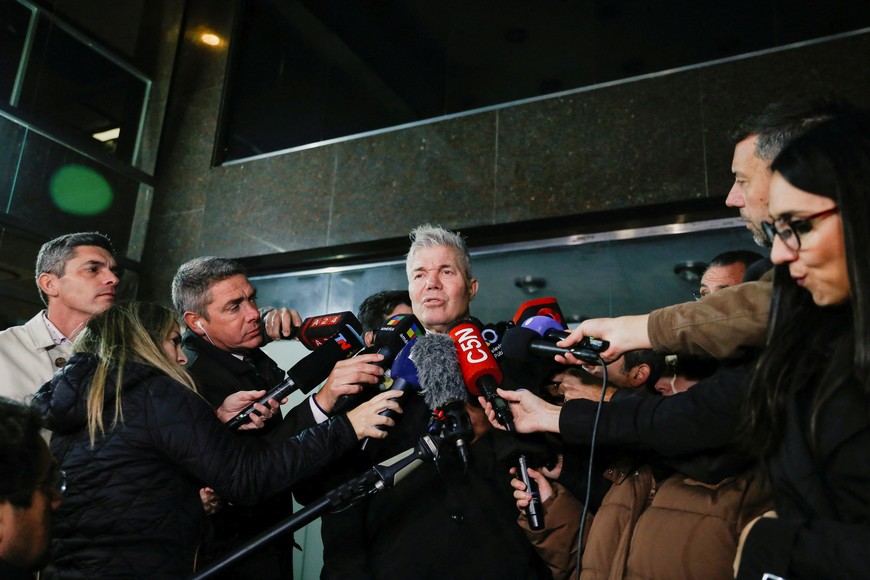 Fernando Burlando, lawyer for the daughters of late Argentine soccer icon Diego Maradona, speaks with the press outside the San Isidro court after Judge Julieta Makintach, one of the three Argentine judges presiding in the trial of seven members of Diego Maradona's medical team charged with negligent homicide in the soccer star's 2020 death, stepped down from the case on Tuesday amid accusations of ethical breaches, in San Isidro, on the outskirts of Buenos Aires, Argentina, May 27, 2025. REUTERS/Francisco Loureiro