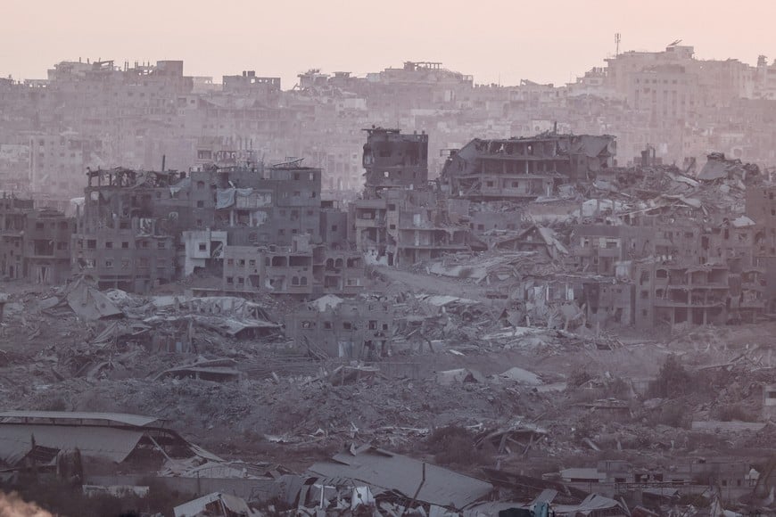 Destroyed buildings in Gaza are seen from the Israeli side of the Israel-Gaza border, July 16, 2025. REUTERS/Amir Cohen