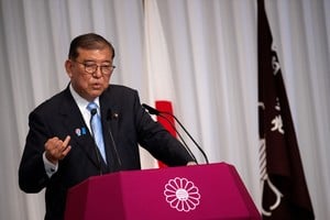 Japan's Prime Minister Shigeru Ishiba attends a press conference at the headquarters of the Liberal Democratic Party (LDP) in Tokyo on July 21, 2025, the day after the prime minister's coalition lost its upper house majority.     PHILIP FONG/Pool via REUTERS