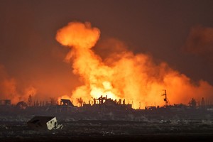 An explosion in Gaza is seen from the Israeli side of the Israel-Gaza border, July 24, 2025. REUTERS/Amir Cohen
     TPX IMAGES OF THE DAY