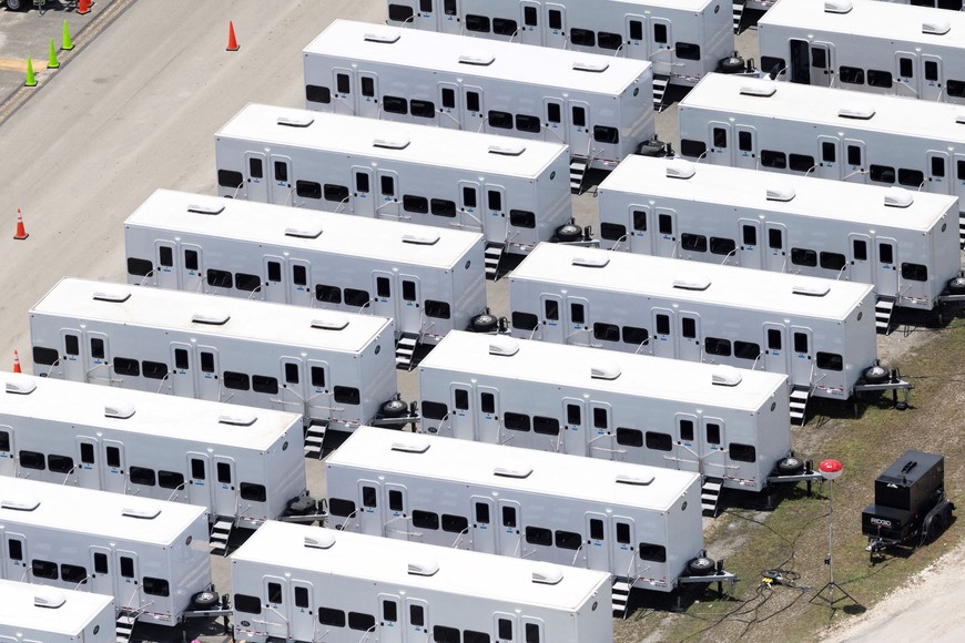 An aerial view shows trailers in "Alligator Alcatraz" ICE detention center at Dade-Collier Training and Transition Airport in Ochopee, Florida, U.S. July 24, 2025. REUTERS/Marco Bello