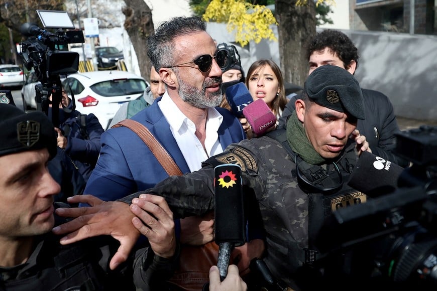 Leopoldo Luque, the personal doctor of late Argentine soccer legend Diego Maradona, leaves the San Isidro court after a hearing to determine the future of soccer legend Diego Maradona's trial, after one of the three presiding judges stood down from the case amid accusations of ethical breaches, in San Isidro, on the outskirts of Buenos Aires, Argentina, May 29, 2025. REUTERS/Agustin Marcarian