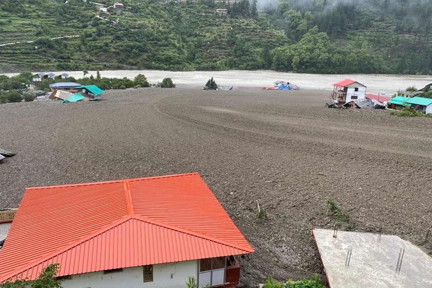 Houses are partially buried by a mudslide, amid flash floods, in Dharali, Uttarakhand, India, August 5, 2025. Indian Army Central Command via X/Handout via REUTERS THIS IMAGE HAS BEEN SUPPLIED BY A THIRD PARTY. MANDATORY CREDIT. NO RESALES. NO ARCHIVES

VERIFICATION
Reuters was able to confirm the location by buildings and terrain which matched file and satellite imagery. The date was verified by official and local media reports of flash flood in the area on Tuesday (August 5).