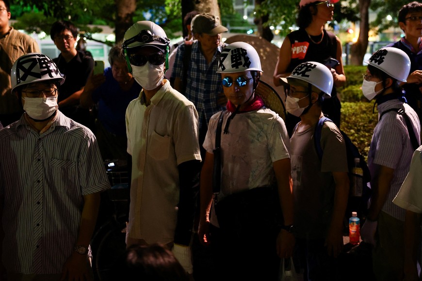 Anti-war and anti-nuclear protesters hold a rally in front of the preserved Atomic Bomb Dome, a day ahead of the 80th anniversary of the World War Two atomic bombing, in Hiroshima, western Japan, August 5, 2025. REUTERS/Kim Kyung-Hoon