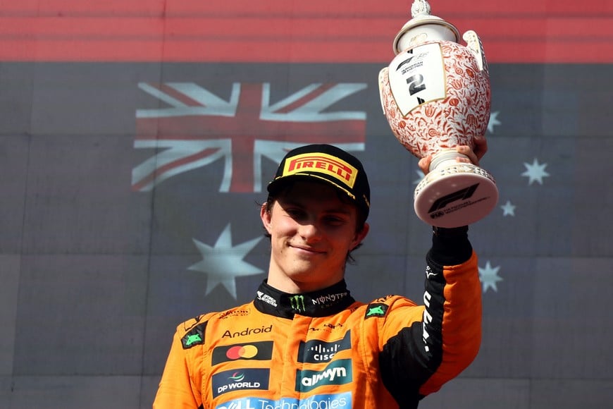 Formula One F1 - Hungarian Grand Prix - Hungaroring, Budapest, Hungary - August 3, 2025
McLaren's Oscar Piastri celebrates on the podium with a trophy after finishing second place in the Hungarian Grand Prix REUTERS/Jakub Porzycki