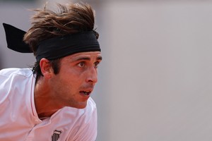 Tennis - French Open - Roland Garros, Paris, France - May 26, 2025
Argentina's Tomas Martin Etcheverry reacts during his first round match against Greece's Stefanos Tsitsipas REUTERS/Gonzalo Fuentes