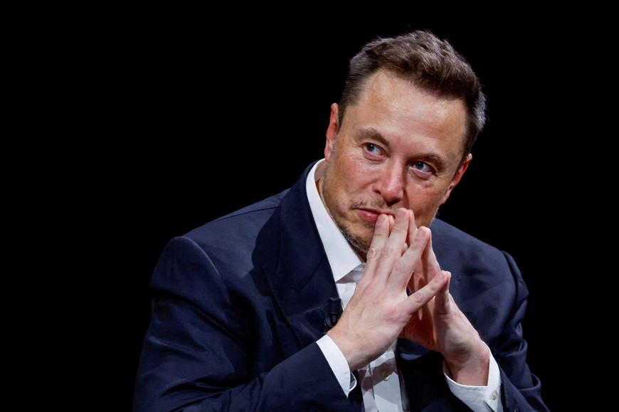 FILE PHOTO: Elon Musk, Chief Executive Officer of SpaceX and Tesla and owner of Twitter, gestures as he attends the Viva Technology conference dedicated to innovation and startups at the Porte de Versailles exhibition centre in Paris, France, June 16, 2023. REUTERS/Gonzalo Fuentes/File Photo