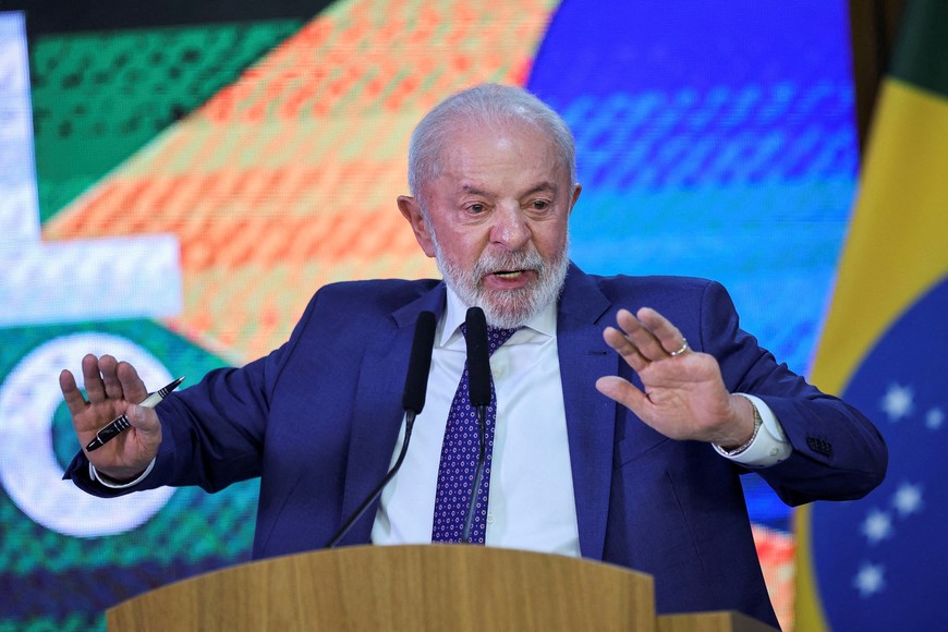 Brazil's President Luiz Inacio Lula da Silva speaks during a ceremony of signing a provisional measure establishing an initial set of actions to mitigate the economic impact due to U.S. President Donald Trump's decision to raise import tariffs on Brazilian products to up to 50%, at the Planalto Palace, in Brasilia, Brazil, August 13, 2025. REUTERS/Adriano Machado REFILE- CORRECTING FROM "BY UP TO 50%" TO "TO UP TO 50%".